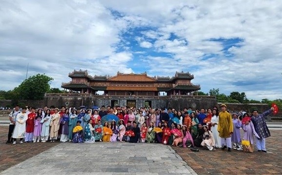 Young overseas Vietnamese pose for a group photo when visiting Hue city in late July during the Vietnam Summer Camp 2023.