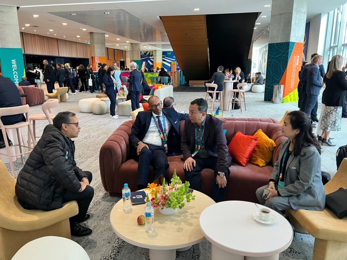Kenny Jean Marie (left), director of Member Associations Services, meets with Tran Quoc Tuan, president of the Vietnam Football Federation (VFF)