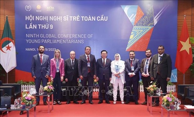 At the reception of NA Chairman Vuong Dinh Hue (centre) for Deputy Speaker of the People’s National Assembly of Algeria Monder Bouden (Photo: VNA)