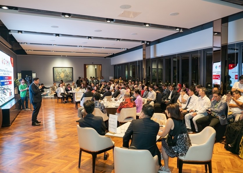 Delegates attending the Trade Promotion and Investment Cooperation program in the celebration of the 50th anniversary of diplomatic relations between Vietnam and Malaysia