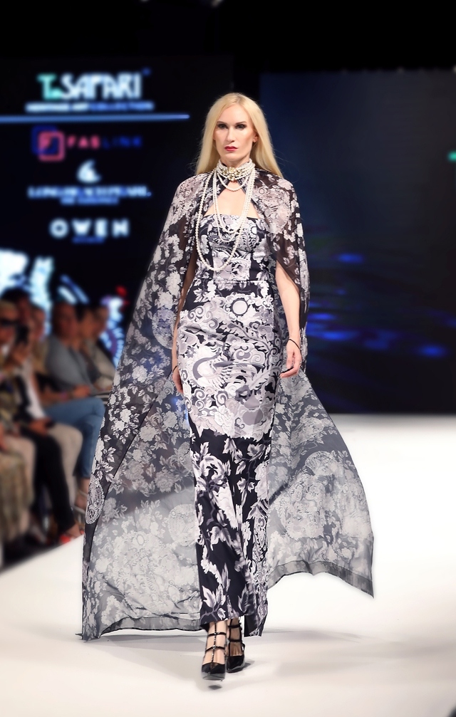 She then introduces her first fashion collection in Singapore in 2005.
