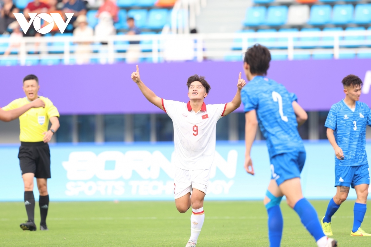 Quoc Viet celebrates scoring the opening goal for the Vietnamese Olympic Team against Mongolia at ASIAD 19