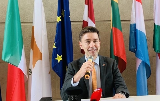 Ambassador and Head of the EU Delegation to Vietnam Julien Guerrier speaks to the press (Photo: dantri.com.vn)
