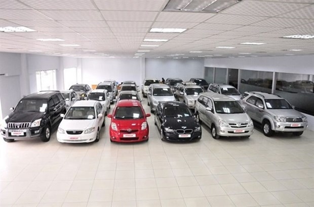 A showroom displays new and used cars for sale in Long Bien district, Hanoi. — Photo courtesy of Anycar.vn