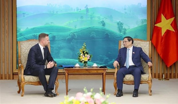 Prime Minister Pham Minh Chinh and Minister of Foreign Affairs of Lithuania Gabrielius Landsbergis. (Photo: VNA)
