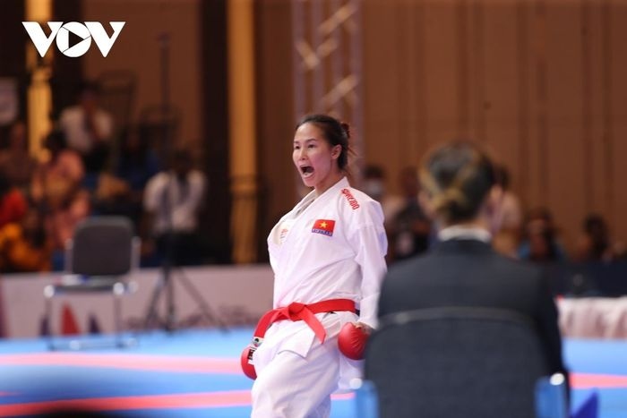 Vietnamese karate athlete Dinh Thi Huong wins bronze medal after defeating Georgia Zefanya of Indonesia