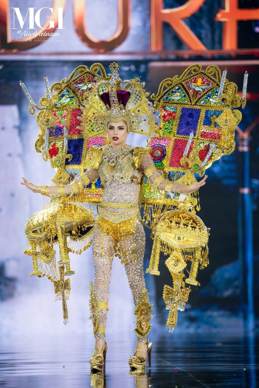 Here is Britthany Marroquin, the contestant from Honduras. Her outfit draws inspiration from mosaic tiles of the Basilica temple.