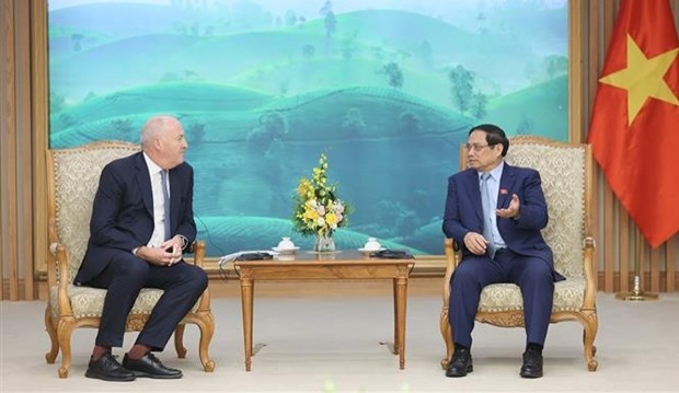 Prime Minister Pham Minh Chinh (R) receives Chairman of John Swire &amp; Sons Limited Guy Bradley in Hanoi on October 24.