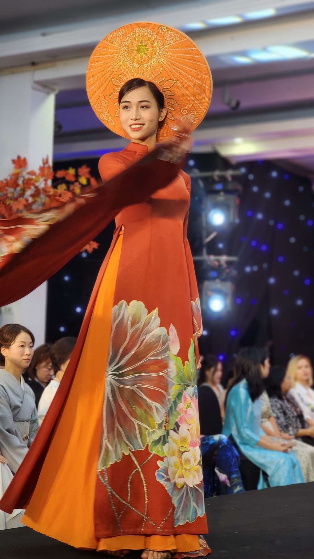 Designer Lan Vy brings a collection of 10 Ao Dai inspired by the lotus flower and Vietnamese legends to the event.