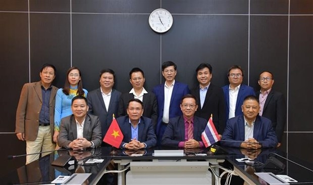 The VJA delegation meets with the delegation of the Thailand Journalists Association. (Photo: VNA)