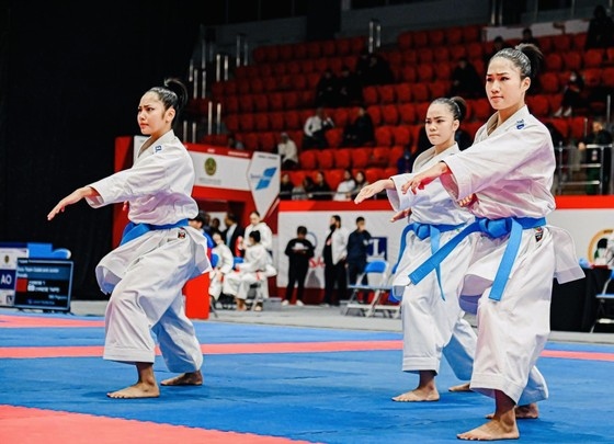 Vietnamese athletes champion in the female kata (performance) cadet and junior team event.