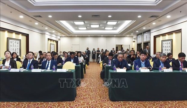 Vietnamese and Chinese participants in the conference in Beijing on November 27