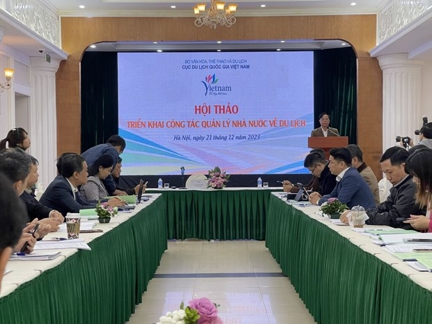 Delegates at a workshop on management of the tourism sector in the new situation held by the Vietnam National Authority of Tourism (VNAT), Hanoi, Dec 21.