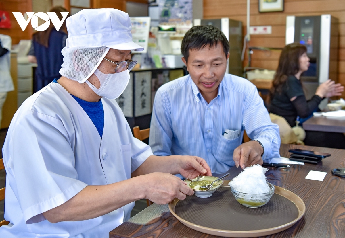 Vietnamese tourists visit a bakery in Sakai, Japan