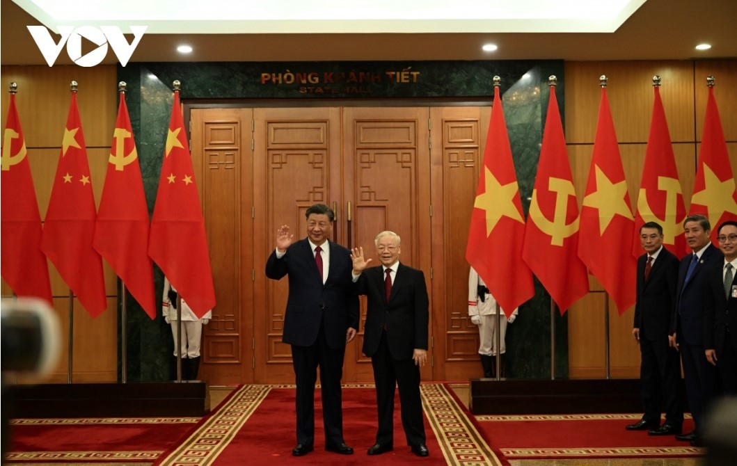 The two leaders pose for a photo together before their talks