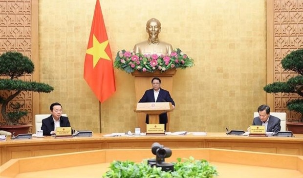 Prime Minister Pham Minh Chinh speaks at the meeting (Photo: VNA)