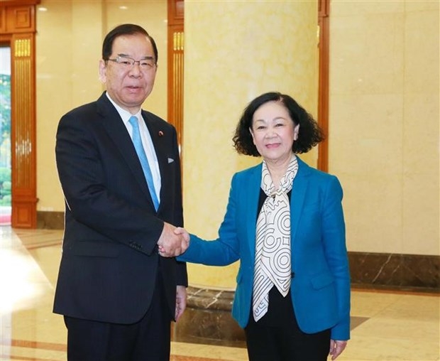 Politburo member, Permanent member of the Communist Party of Vietnam (CPV) Central Committee's Secretariat, and Chairwoman of the CPV Central Committee's Organisation Commission Truong Thi Mai (R) and Chairman of the Presidium of the Japanese Communist Party (JCP) Central Committee Shii Kazuo