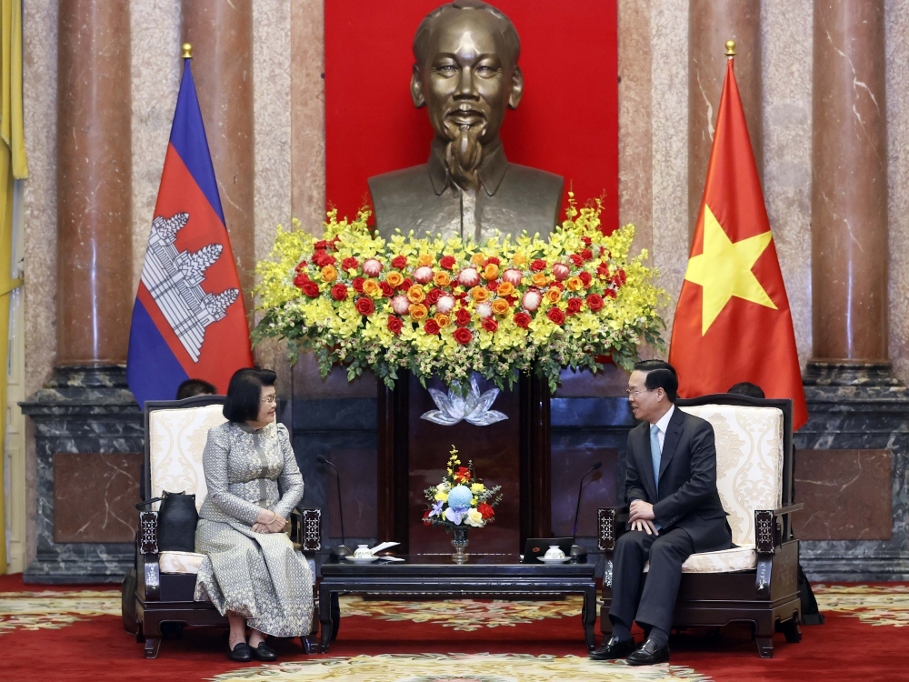 Vietnamese President Vo Van Thuong (R) receives visiting Cambodia National Assembly Chairwoman Khuon Sudary in Hanoi on December 1