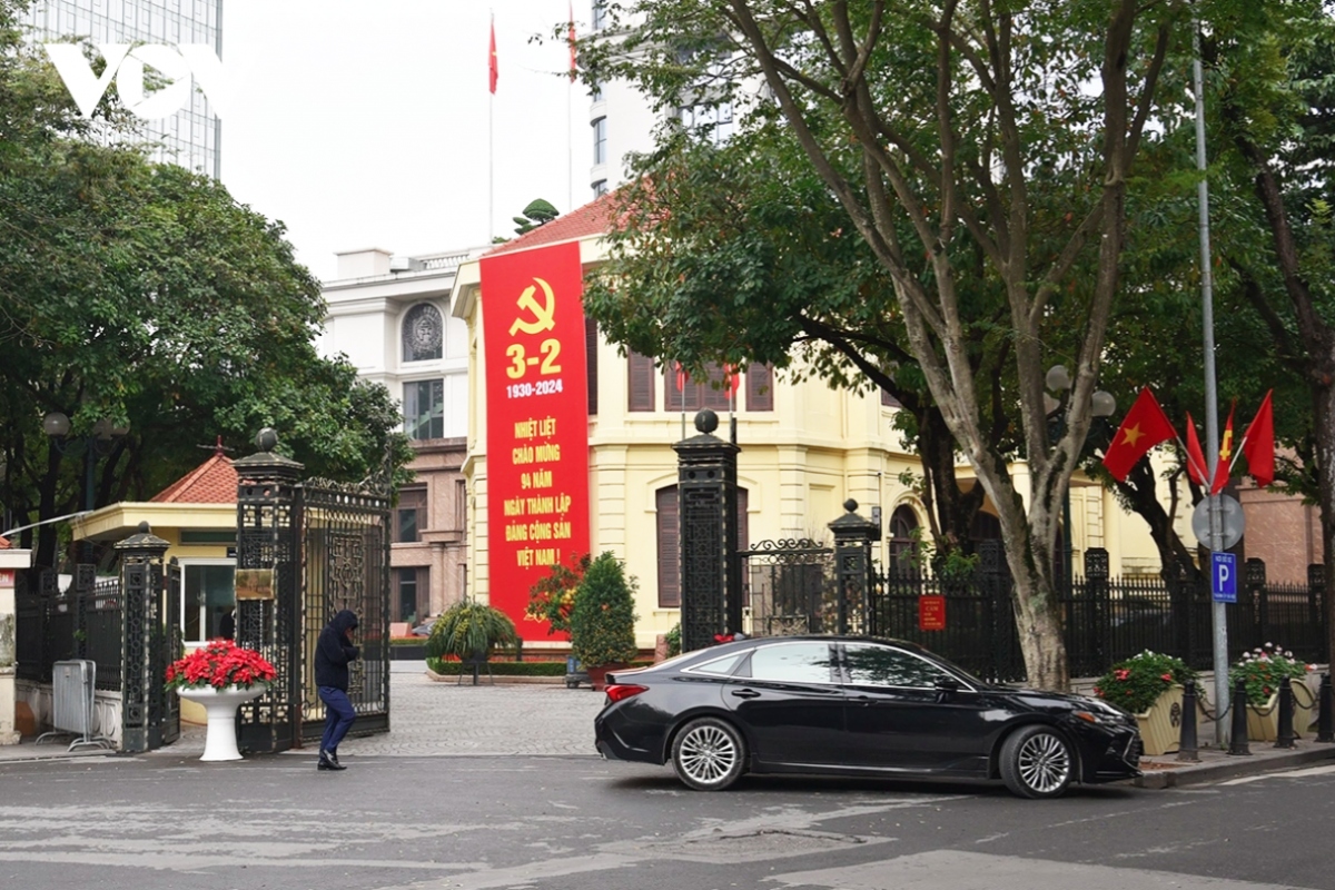 Office buildings across Hanoi are covered in red as part of the celebrations.