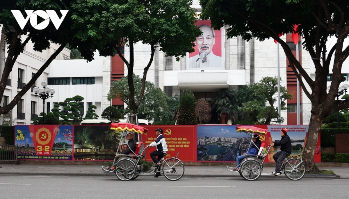 A large banner erected at the headquarters of the Hanoi Party Committee reads “Celebrating 94 Years of the Communist Party of Vietnam”