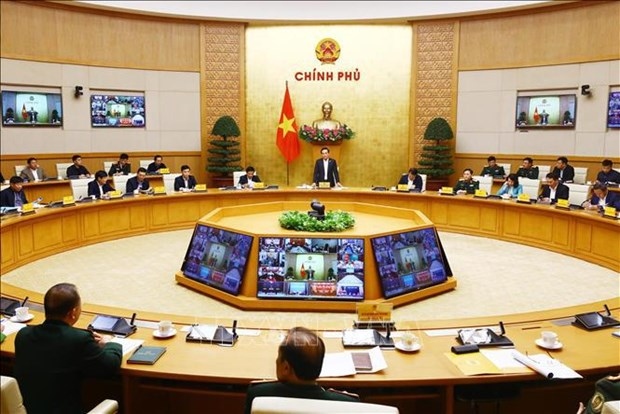 Deputy Prime Minister Tran Luu Quang chairs a conference in Hanoi on January 12 to review performance in 2023 and implement tasks for 2024 of the National Civil Aviation Security Committee.