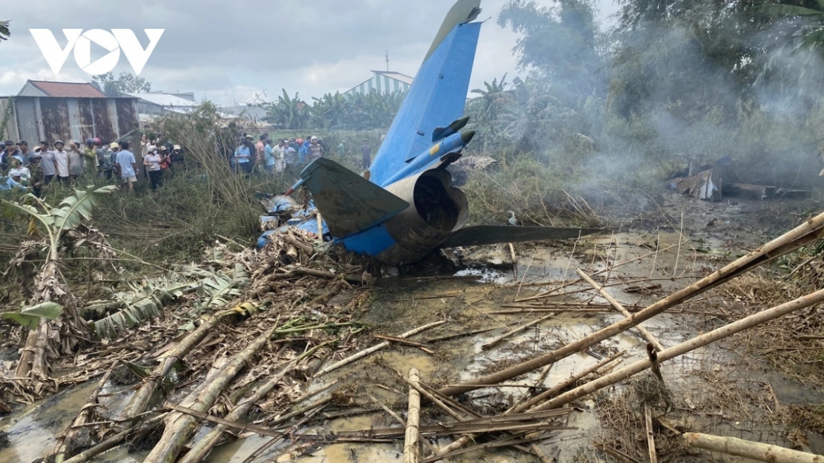 The wreckage of the military trainer aircraft at the scene.