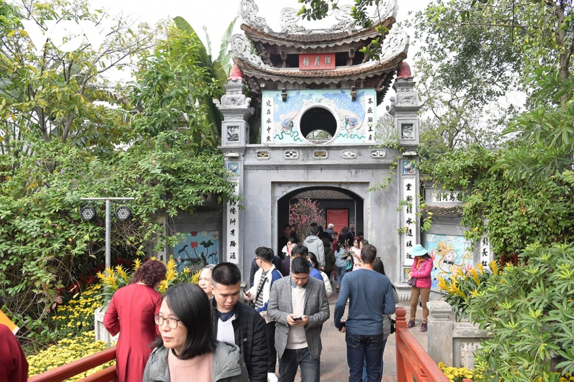 . Ngoc Son Temple is also packed with people on the first day of Tet.