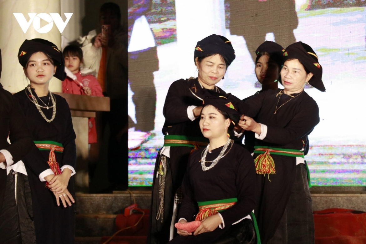 Tay ethnic people re-enact a wedding ceremony during the festival.