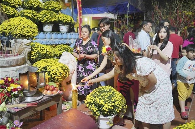 Going to pagodas on the first lunar days remains a tradition of Vietnamese people both at home and abroad.