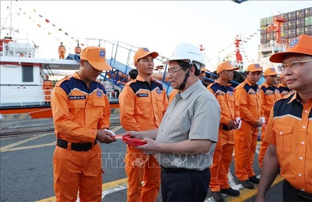 Prime Minister Pham Minh Chinh extends New Year greetings to personnel working at Tan Cang - Cai Mep international port (TCIT)