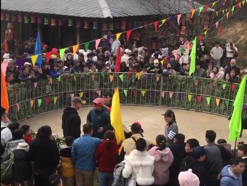 Tourists show their excitement at taking part in the game.