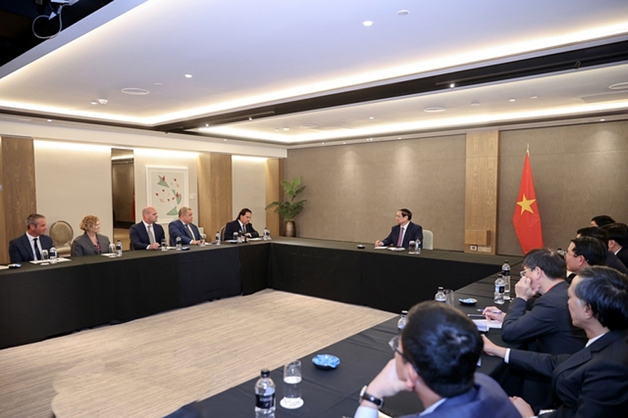 An overview of the meeting between Vietnamese Prime Minister Pham Minh Chinh and Simon Bridges, CEO of the Auckland Business Chamber on March 9. (Photo: VGP)