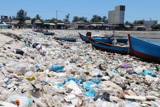 Waste covers the Sa Huynh saltwater lagoon in Duc Pho town, Quang Ngai province.