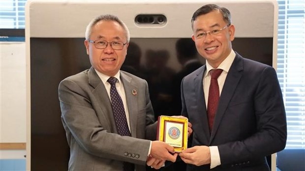 Auditor General Ngo Van Tuan (right) meets with UN Under-Secretary-General for Economic and Social Affairs Li Junhua in New York