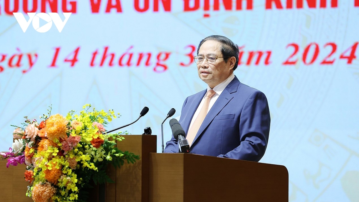 Prime Minister Pham Minh Chinh addresses the national conference on monetary policy management in 2024 in Hanoi on March 14