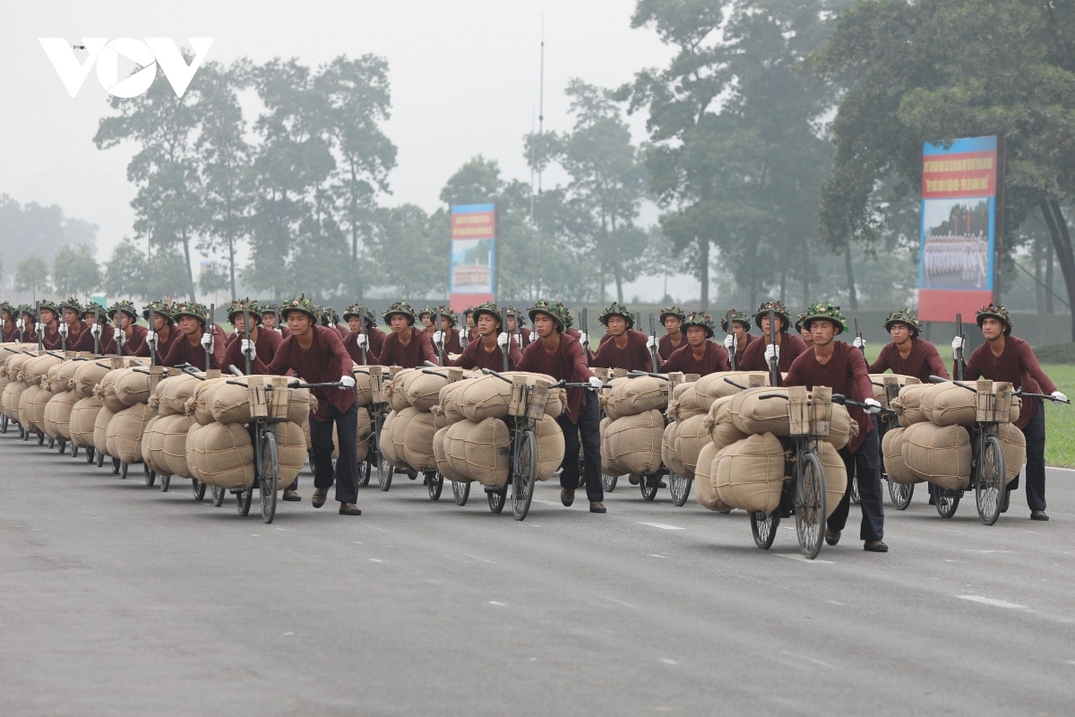 A group of militia present during the rehearsal. During the Dien Bien Phu battle, they carried supplies to the front lines