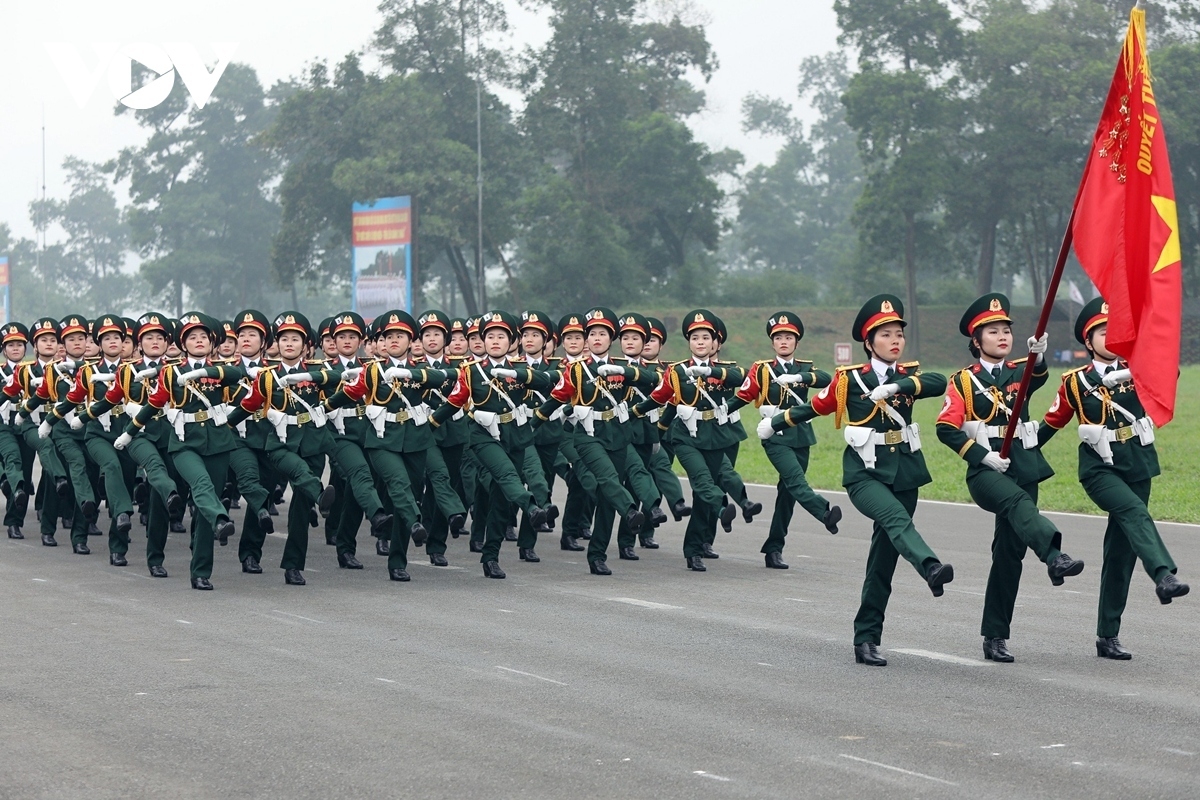Female military medical officers practice ahead of the parade.