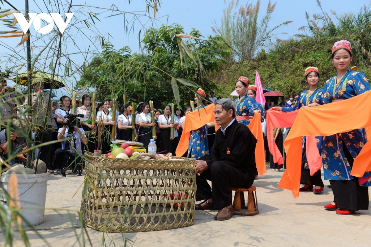 The sorcerer offers incense to the earth, river, and stream gods, praying for blessings for local villagers.