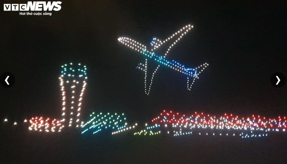 An image of Van Don International Airport’s logo is created during a drone light show.