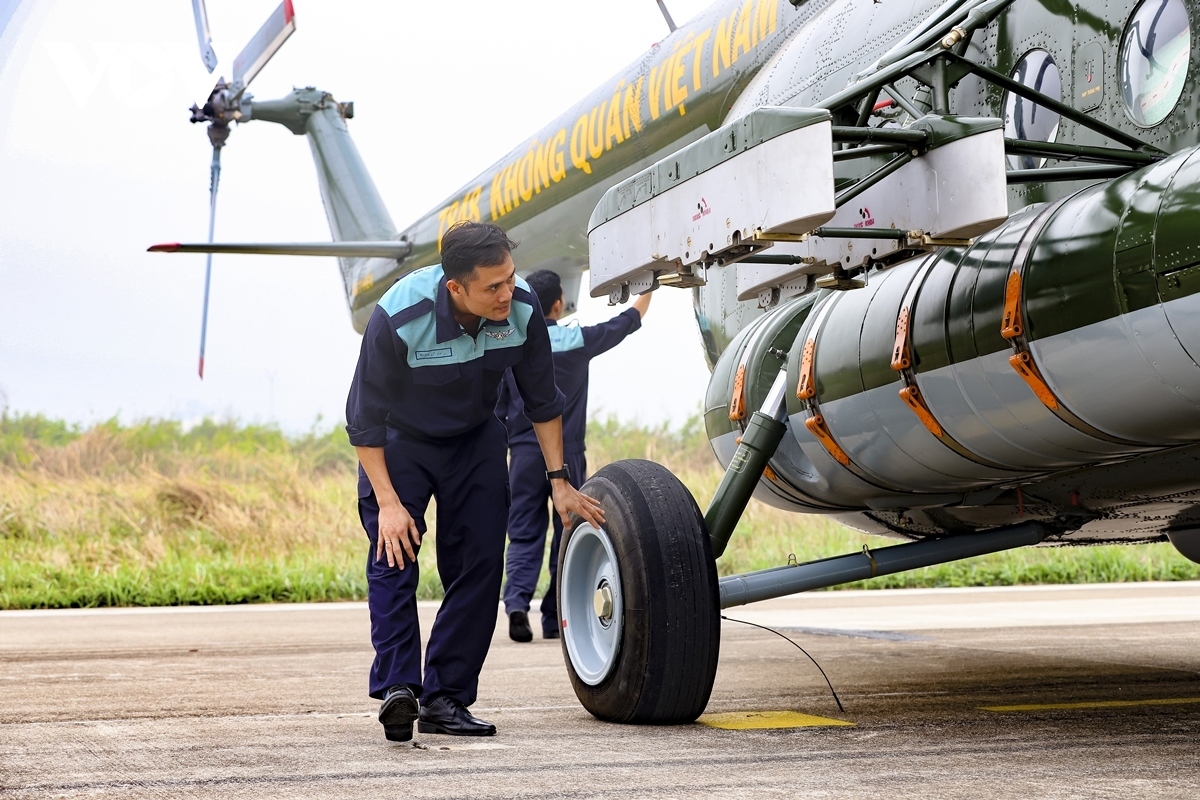A helicopter is thoroughly checked before being allowed to fly.