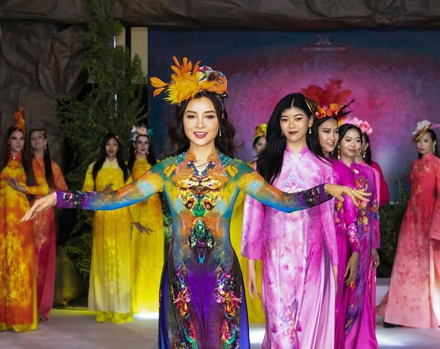 Model and dancer Mai Thu Trang wears an Ao Dai outfit by designer Do Trinh Hoai Nam.