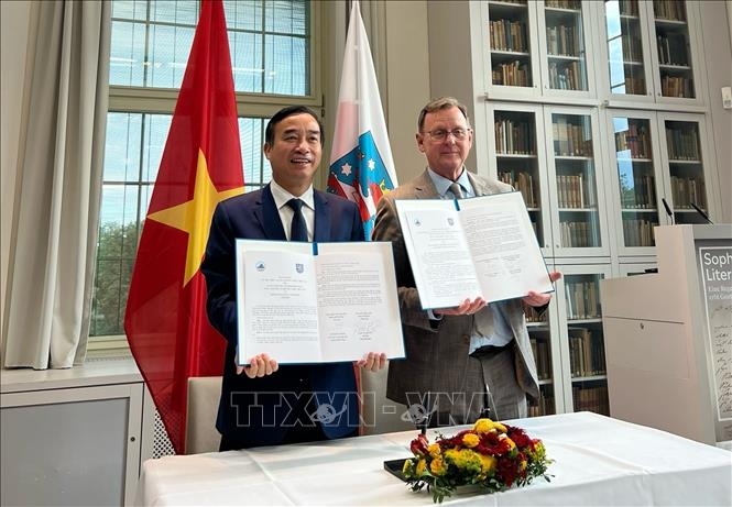 An overview of the signing ceremony (Photo: VNA)