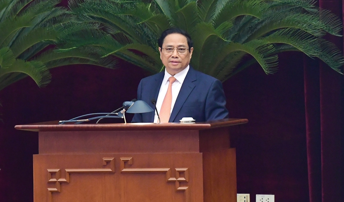 Prime Minister Pham Minh Chinh and Politburo member speaks at the plenum.