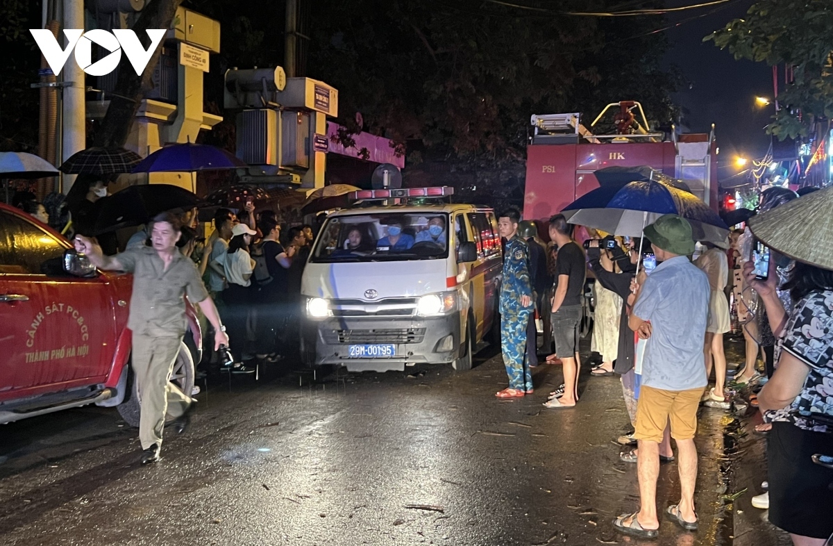 The blaze is brought under control at about 8 p.m. as firefighters start to be able to move inside to look for trapped victims. A total of four bodies are found dead.