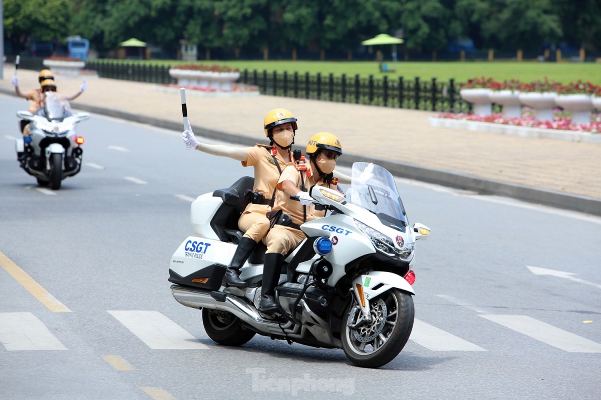 Traffic police officers are tasked with smoothing traffic flow in order to better facilitate the delegation’s movement.