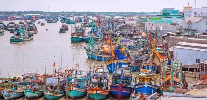Offshore fishing boats docking at the seaport of Song Doc township, Tran Van Thoi district, the Mekong Delta province of Ca Mau