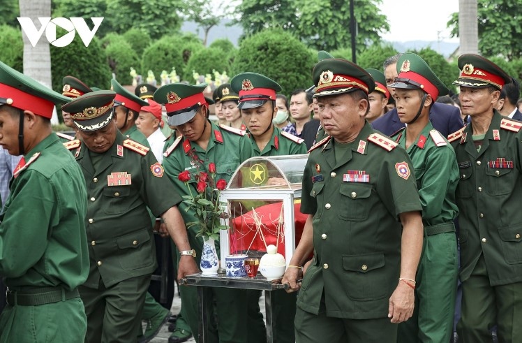 A memorial and burial service is held at Tong Khao martyr cemetery