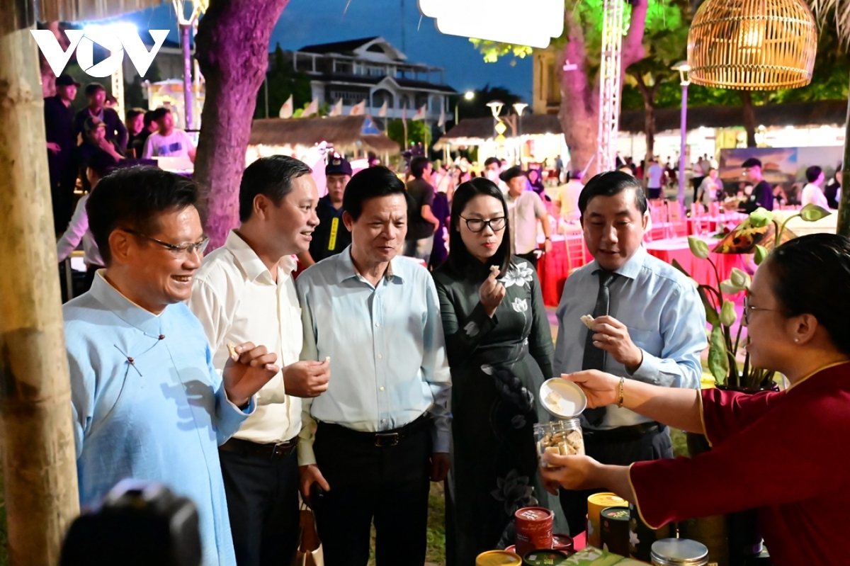 Delegates and tourists enjoy sampling a range of delicacies on offer at booths set up at the festival.