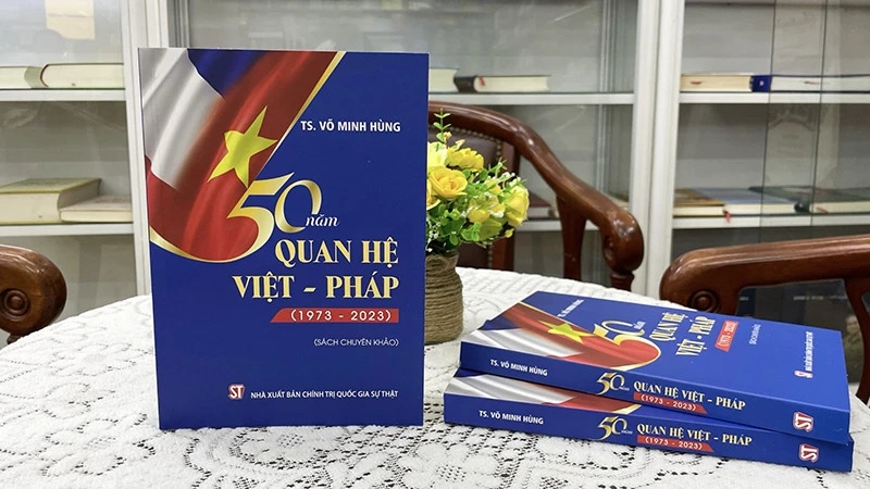 The book featuring 50 years of diplomatic ties between Vietnam and France from 1973 to 2023. (Photo: nhandan.vn)