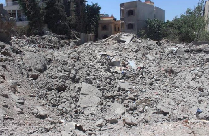 Building destroyed in Israeli Airstrike in Houla, Lebanon, on July 21, 2024. (Photo: Xinhua/VNA)